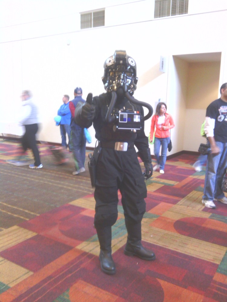 Knitting is apparently now an intergalactic hobby!  We caught this guy checking out the yarn.  How cute would those tubes look yarn bombed?